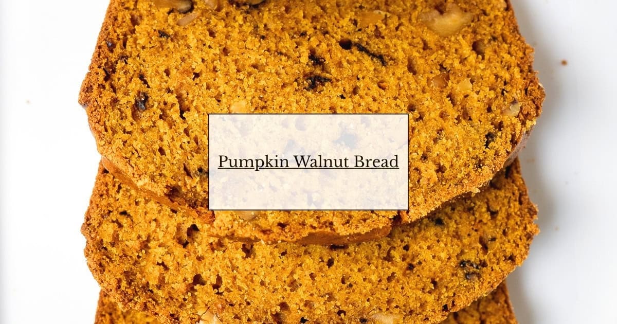 Slices of pumpkin walnut bread on platter.